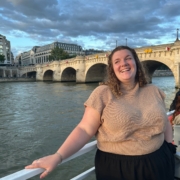Clara Gay, LSW - Taking a boat tour of Paris on the Seine