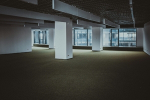 An empty office space in a large building.