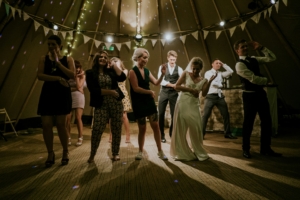 A group of young adults dancing.