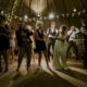 A group of young adults dancing.