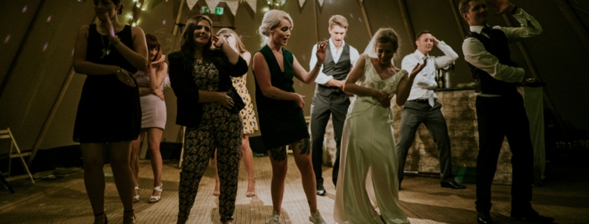 A group of young adults dancing.