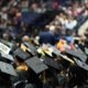 A group of people wearing graduation caps at a graduation ceremony.